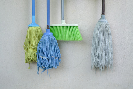 Used mops and broom - cleaning iconsの写真素材