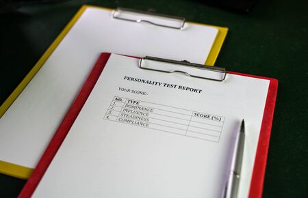 Personality test report. On clipboard. Human Resource, career or Job Interview concept.の写真素材