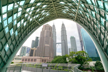 Kuala Lumpur, Malaysia - June 11, 2020: Petronas Twin Towers and KL Skyline from Saloma Link Bridge.