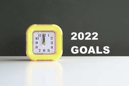 2022 goals. With clock on table. Copy space.の写真素材