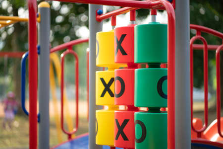 Colorful Tic Tac Toe on a children playground.