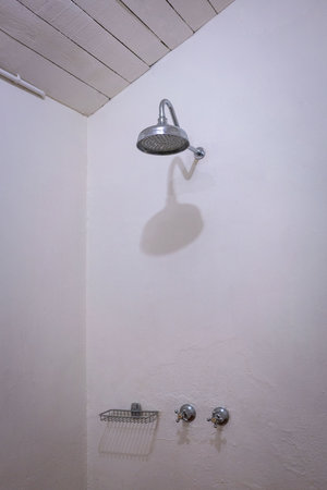 White color bathroom with shower head.の写真素材