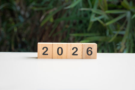 2026 on square blocks on top of white surface. New year concept.の写真素材