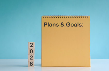 2026 on square wooden blocks stacked up. Plans & goals planner.