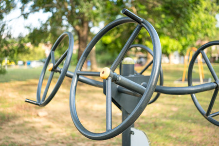 Double Stretching Wheel in the park, exercise or fitness equipment. Outdoor gym.の写真素材