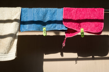 Towels hanging laundry outdoor for drying.の写真素材