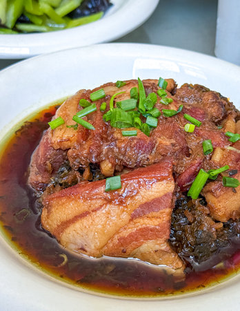 Chinese Pork Belly with preserved vegetables dish. High angle view.の写真素材