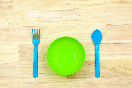 Colorful plastic bowl and Cutlery for a childrenの写真素材