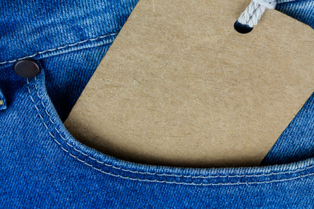 Vintage paper tag in blue denim