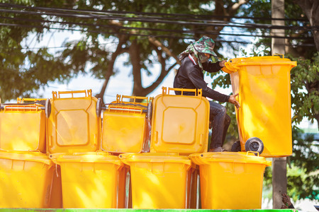 RAYONG, THAILAND-OCTOBER 15 2017: stack of yellow waste bins at public park on October 15, 2017 Rayong,. Thailand.のeditorial素材