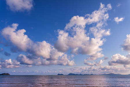 Blue sky with clouds over sea.selective focus.の写真素材