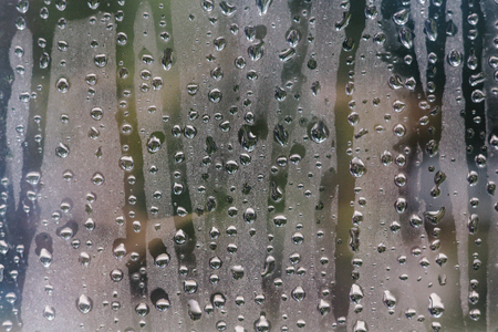 Water drops on car glassの写真素材