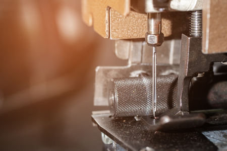 Detail of sewing machine and sewing accessories, old sewing machine.selective focus.