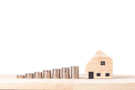 Miniature wooden houses. The concept of low cost real estate. Lower mortgage interest rates. Falling prices for rental housing and apartments. Reducing demand for home buyingの写真素材