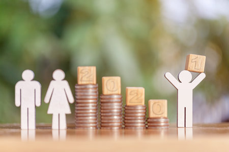 2021 and Coins stack. Pension fund,  Passive income. Investment and retirement. Business investment growth concept. Risk management. Budget 2021.の写真素材