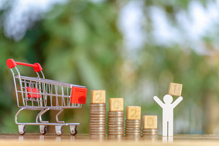 2021 and Coins stack. Pension fund, Passive income. Investment and retirement. Business investment growth concept. Risk management. Budget 2021.の写真素材