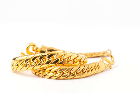 golden bangle bracelet isolated on the white background.selective focus.の写真素材