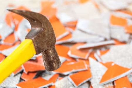 Pieces of concrete, brick and tiles debris from demolished old house on landfillの写真素材