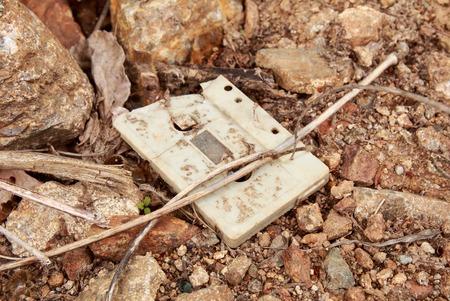 Old and abandoned Cassette Tape in the soilの写真素材