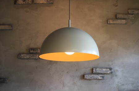 Pendant lamp on gray wall background