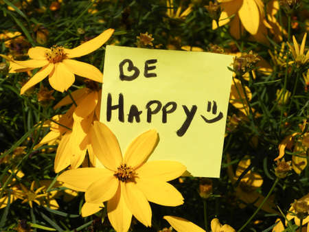 Be happy note in the flowers, positive thinkingの写真素材