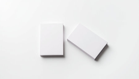 Blank business cards isolated on white background. Mockup for branding identity.の素材