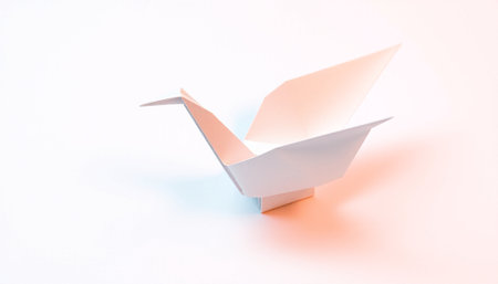 Paper boat isolated on white background, origami concept, copy spaceの素材