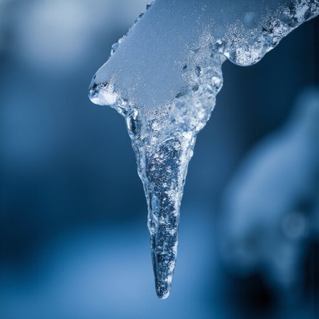 Icicle on a blue background. Shallow depth of field.の素材