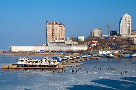 Fishermen on the ice in winterのeditorial素材