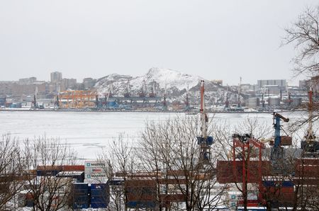 Vladivostok. Port in the snowy darkness. Golden Horn bayのeditorial素材