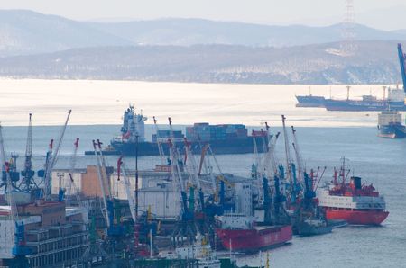 Port of Vladivostok. Golden Horn Bay. Container ship enters the portのeditorial素材
