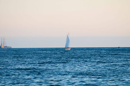 Sailing yacht enters the bayのeditorial素材