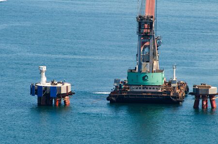 Construction of a new oil terminal in Primorsky Krai in Kozmino bay. Buoy mooring for supertankers. Terminal is being built near the city of Nakhodka.のeditorial素材