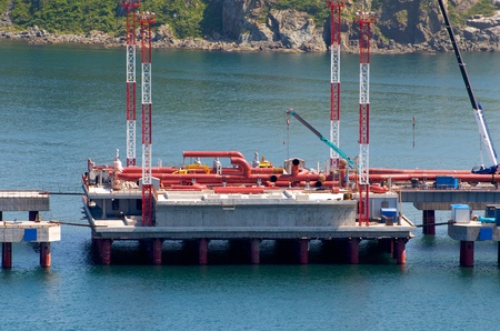 Oil Terminal in the Bay Kozmina Primorsky Krai near the city of Nakhodka. The site is under construction marine pipeline.のeditorial素材