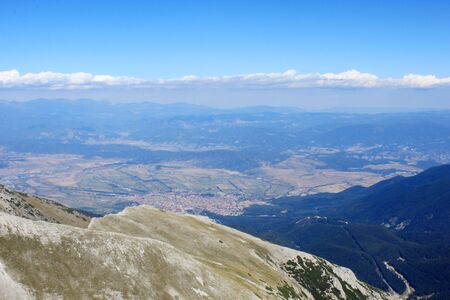 An aerial view of Bansko - famous ski resort in Bulgaria from the Vihren peak in the Pirin mountains.の写真素材
