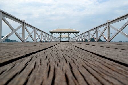 White pavilion on the wooden bridge. の写真素材
