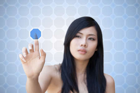 Portrait of Asian girl press recycle button, creative concept of ecologicalの写真素材