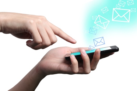 Businessman send massage on mobile phone の写真素材