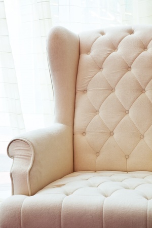 The white luxury armchair isolated on white backgroundの写真素材