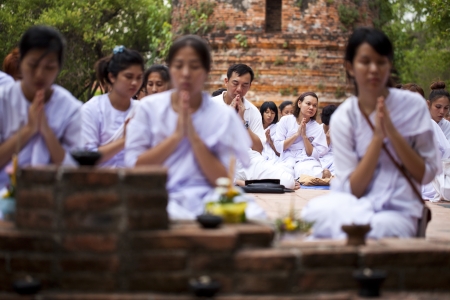 AYUTHAYA, THAILAND - JUN 24 : The religious practices of Buddhists in Visakha Puja Day on June 24, 2013. Ayuthaya, Thailand.Visakha Puja Day is the three important incident of Budhha, birth day, enlightenment and nibbana.のeditorial素材