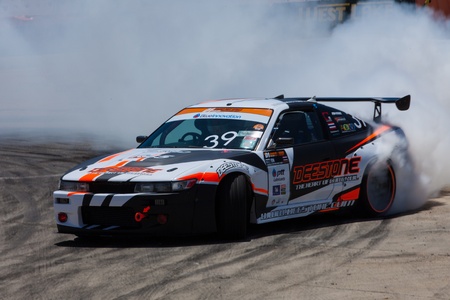 NONTHABURI THAILAND-JUNE 30 : Ch. Siriwattanakul, Thai driver from Destone Lenso Drift Team in D1 Grand Prix Series Thailand Professional Drift on June 30, 2013  in Nonthaburi, Thailand.のeditorial素材
