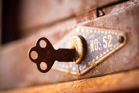 The old key in rusty box の写真素材