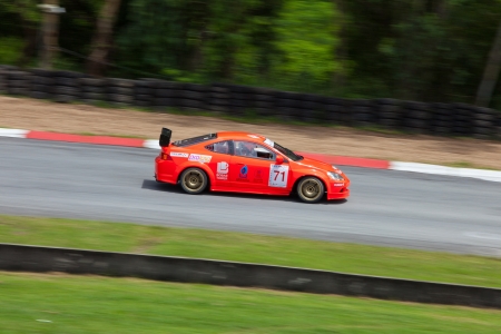 PATTYA, THAILAND-AUG.17 : Supachai W. Drive no. 71 in Super 2000 Round 3 during the Thailand Super Series 2013 Round 3-4 at Bira International Circuit on August 17, 2013 in Pattaya, Thailandのeditorial素材