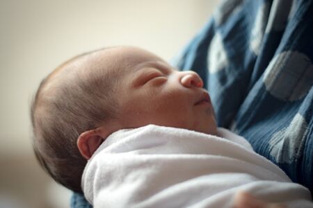 Close up and selective focus of one day old babyの写真素材