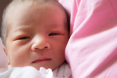 Close up and selective focus of one day old babyの写真素材
