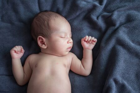 Portrait of cute Asian baby, concept create newborn.の写真素材
