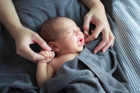 Portrait of cute Asian baby, concept create newborn.の写真素材