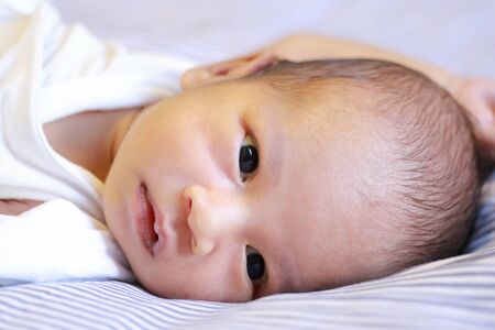 Portrait of cute Asian baby, concept create newborn.の写真素材