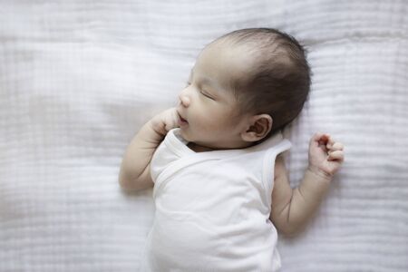 Portrait of cute Asian baby, concept create newborn.の写真素材