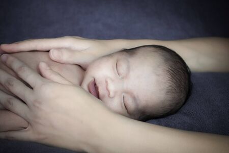 Portrait of cute Asian baby, concept create newborn.